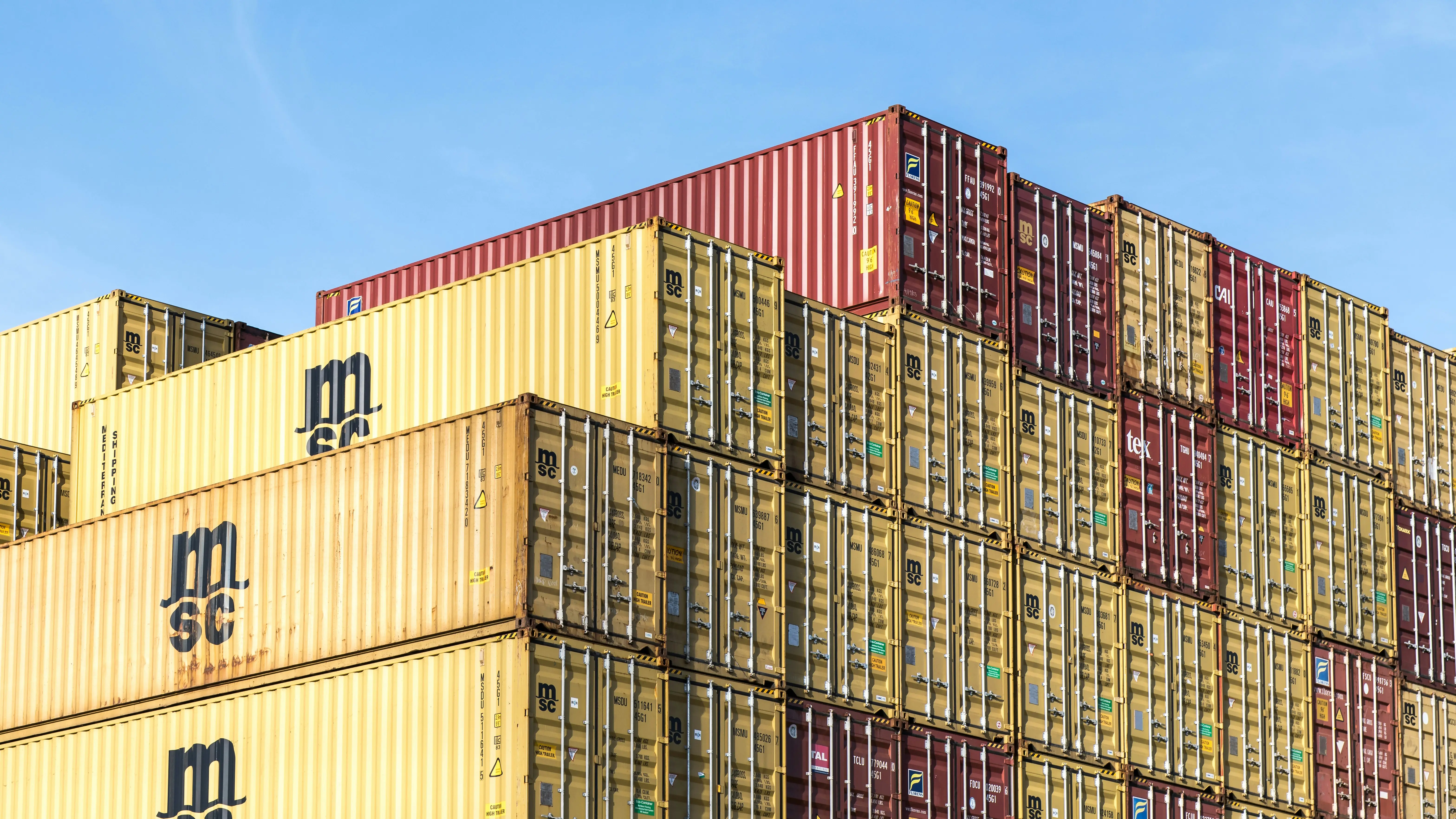 Courier carrying a hard case with radios